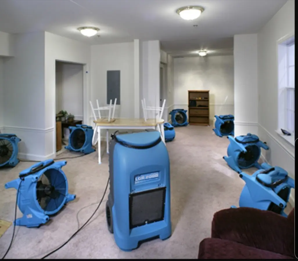 Air movers and dehumidifier setup for Water Damage Restoration in Oakwood